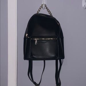 Black bag with gold detailing